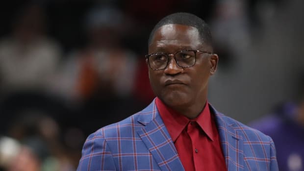 Dominique Wilkins looks on during a game.